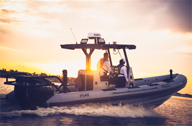 Marine unit on patrol with sunset