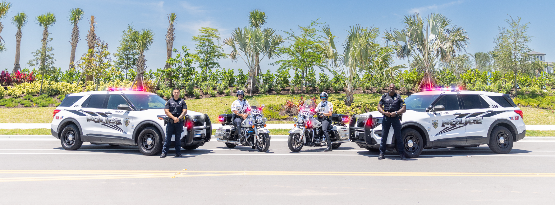 Officers with patrol vehicles and motorcycles