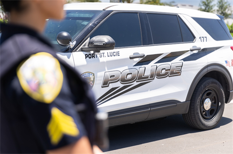 police officer and patrol car